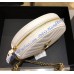 Saint Laurent VINYLE round camera bag in chevron-quilted grain de poudre embossed leather YSL610436-white