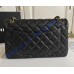 Chanel Jumbo Classic Flap Bag in Black Caviar Leather with golden hardware