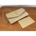Saint Laurent UPTOWN chain wallet in grain de poudre embossed leather YSL607788-tan