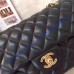 Chanel Small Classic Flap Bag in Black Lambskin with golden hardware