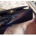Chanel Jumbo Classic Flap Bag in Black Lambskin with golden hardware