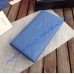 Gucci GG Marmont continental wallet in Blue leather with a chevron design